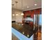 Modern kitchen with stainless steel appliances and granite countertops at 701 Royal Ct # 309, Charlotte, NC 28202