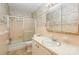 Bathroom with shower/tub combo and wood-look walls at 621 Oak Grove Rd, Kings Mountain, NC 28086