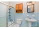 Clean bathroom with light blue tile and shower/tub combo at 621 Oak Grove Rd, Kings Mountain, NC 28086