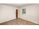 Bedroom with tile floor, one window and access to bathroom at 621 Oak Grove Rd, Kings Mountain, NC 28086