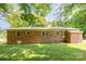 Brick house exterior with mature trees and a spacious lawn at 621 Oak Grove Rd, Kings Mountain, NC 28086