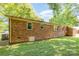 Brick house exterior with large windows and a grassy yard at 621 Oak Grove Rd, Kings Mountain, NC 28086