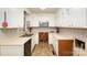 Kitchen with white cabinets, built-in microwave, and tile floor at 621 Oak Grove Rd, Kings Mountain, NC 28086