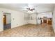 Living room with kitchen, tile floor and access to entryway at 621 Oak Grove Rd, Kings Mountain, NC 28086