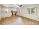 Open living area with tile floor and kitchen access at 621 Oak Grove Rd, Kings Mountain, NC 28086