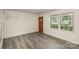 Living room with wood-look floors and a large window at 621 Oak Grove Rd, Kings Mountain, NC 28086