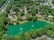 Beautiful aerial view of a pond and condos at 7378 Winery Ln, Charlotte, NC 28227