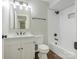 Bathroom featuring vanity sink and a shower-tub combo with white subway tile at 7378 Winery Ln, Charlotte, NC 28227