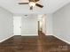 Spacious bedroom with hardwood floors and two closets, providing ample storage space at 7378 Winery Ln, Charlotte, NC 28227