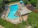 A community pool with a lounge area and shade at 7378 Winery Ln, Charlotte, NC 28227