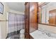 Functional bathroom design featuring a vanity, mirror, and a combined shower and bathtub at 915 Timberlane Dr, Mount Holly, NC 28120