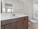 Modern bathroom boasts a sleek vanity with white countertop and stylish fixtures, plus a shower-tub combo at 4679 Hopsack Dr # Cal0108, Indian Trail, NC 28079
