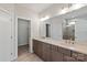 Bathroom featuring double sinks, modern cabinetry, and a glass-enclosed shower at 4679 Hopsack Dr # Cal0108, Indian Trail, NC 28079