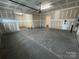 Spacious two car garage with sealed concrete floor and drywall ready for paint at 4679 Hopsack Dr # Cal0108, Indian Trail, NC 28079