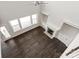 Vaulted ceiling living room boasting hardwood floors and a cozy fireplace at 4679 Hopsack Dr # Cal0108, Indian Trail, NC 28079