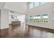 Open living space with island kitchen, stainless appliances, and lots of light at 4679 Hopsack Dr # Cal0108, Indian Trail, NC 28079
