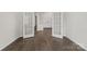 Home office space featuring glass doors and hardwood floors at 4679 Hopsack Dr # Cal0108, Indian Trail, NC 28079