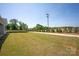 Spacious grassy yard featuring a sidewalk and bordering trees, perfect for enjoying the outdoors and neighborhood views at 4679 Hopsack Dr # Cal0108, Indian Trail, NC 28079