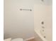 This bright bathroom showcases a tub/shower combination at 1125 Kurt Ct, Charlotte, NC 28209