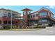 Shopping center with a variety of restaurants and shops and lush landscaping at 1125 Kurt Ct, Charlotte, NC 28209