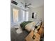 Bedroom with natural light, carpet, and a ceiling fan, creating a comfortable atmosphere at 805 W Main St, Marshville, NC 28103
