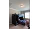 This bedroom features a black bunk bed and cool-tone walls and trim at 2044 Sweet William Dr, Harrisburg, NC 28075