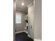 The mud room has light-gray walls and a storage system at 2044 Sweet William Dr, Harrisburg, NC 28075
