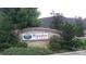Stone community sign with beautiful landscaping at Wynnshire Ridge provides a warm welcome at 833 B Wynnshire Dr # 55, Hickory, NC 28601