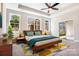 Spacious main bedroom boasts a tray ceiling, bright windows, and a sliding glass door at 833 A Wynnshire Dr # 56, Hickory, NC 28601