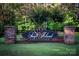 Elegant entrance sign for Swift Island Plantation amidst lush greenery, creating an inviting community entrance at 416 Plantation Way, Mount Gilead, NC 27306