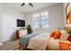 Comfortable bedroom featuring a large window, stylish furniture and carpet flooring at 831 B Wynnshire Dr # 60, Hickory, NC 28601