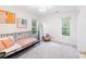 Comfortable bedroom with large windows and carpeted floors, offering bright, open space at 2907 Meherrin Ct, Waxhaw, NC 28173