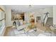 Open-concept living area seamlessly flows into the kitchen and dining room with lots of natural light at 2907 Meherrin Ct, Waxhaw, NC 28173
