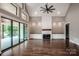 Spacious living room with hardwood floors, fireplace, and built-in shelving perfect for entertaining and relaxing at 110 Emmaline Ct, Troutman, NC 28166