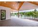 Covered patio with wood ceiling, ceiling fans and gorgeous lake views at 110 Emmaline Ct, Troutman, NC 28166