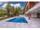 Beautiful in-ground pool and patio area, perfect for outdoor entertaining and relaxation with lake view at 110 Emmaline Ct, Troutman, NC 28166