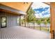 Large deck overlooking a tranquil lake, offering serene outdoor living and picturesque views at 116 Emmaline Ct, Troutman, NC 28166