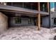 Covered patio features tile flooring, recessed lighting, and access to the backyard and pool at 116 Emmaline Ct, Troutman, NC 28166