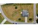 A charming single-story home features a driveway and sits on a spacious lot with mature trees at 104 Castle Pines Ln, Statesville, NC 28625