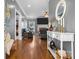 Inviting living room with hardwood floors, fireplace, and comfortable seating at 104 Castle Pines Ln, Statesville, NC 28625