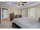 Large main bedroom with neutral walls, carpet flooring and walk-in closet at 104 Castle Pines Ln, Statesville, NC 28625