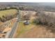An aerial view of the property showing house, driveway, trees and surroundings at 8255 W Nc 10 Hwy, Vale, NC 28168