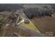 Aerial view of new construction home highlighting lot size, landscaping, and surrounding area at 8255 W Nc 10 Hwy, Vale, NC 28168