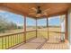 Relaxing back porch with wood floors, wood ceiling and view of a green meadow at 8255 W Nc 10 Hwy, Vale, NC 28168
