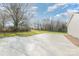 Spacious backyard area featuring a large cement patio and green grass at 8255 W Nc 10 Hwy, Vale, NC 28168