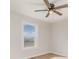 Neutral bedroom with wood-look flooring and a ceiling fan; natural light from the window at 8255 W Nc 10 Hwy, Vale, NC 28168