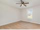 Neutral bedroom with wood-look flooring, ceiling fan and natural light from the window at 8255 W Nc 10 Hwy, Vale, NC 28168