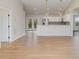 Bright, modern kitchen with stainless steel appliances, white cabinets, and an open layout to the deck at 8255 W Nc 10 Hwy, Vale, NC 28168