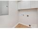 Functional laundry room with storage cabinets and hookups for washer and dryer at 8255 W Nc 10 Hwy, Vale, NC 28168