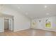 Bright, airy living room with hardwood floors, recessed lighting, and views through multiple windows at 8255 W Nc 10 Hwy, Vale, NC 28168